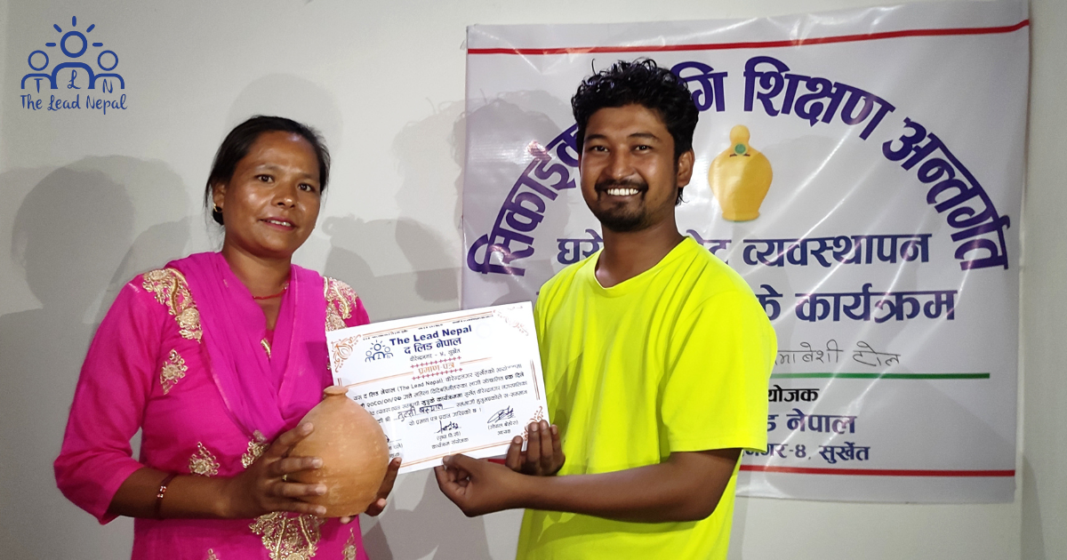 Crowned moment with certificate of achievement.